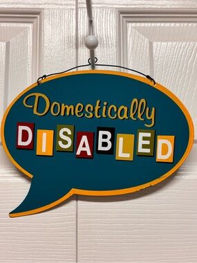Domestically Disabled Teal and Yellow Wall Sign